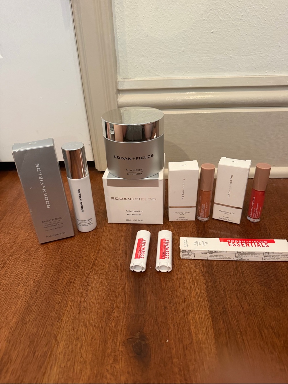 Rodan + Fields Lip & Skincare Set with Silver Packaging and Neutral Lip Shades
